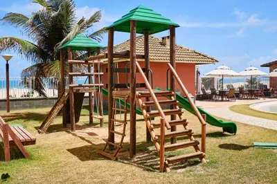 A área de jogos para crianças em TERRAMARIS - APARTAMENTO PÉ NA AREIA