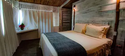 Uma cama ou camas num quarto em Casa Janjão