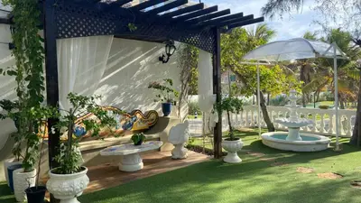 Um jardim no exterior de Casa na praia, Porto das Dunas, Aquiraz