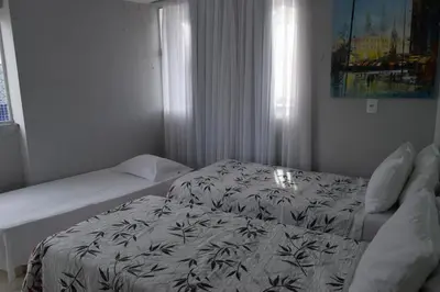 Uma cama ou camas num quarto em VIP Beira Mar Residence