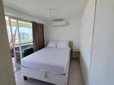 Uma cama ou camas num quarto em VIP Beira Mar Residence