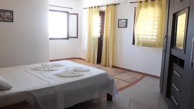 Uma cama ou camas num quarto em Villa Serena