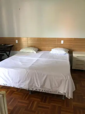 Uma cama ou camas num quarto em Hotel Oiticica