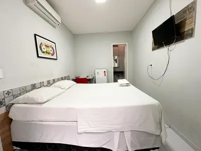 Uma cama ou camas num quarto em Hotel Oiticica