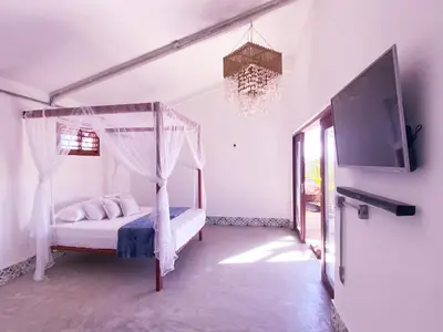 Uma cama ou camas num quarto em Kite Soul Pousada