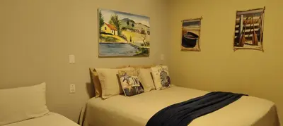 Uma cama ou camas num quarto em Chalés da Cris