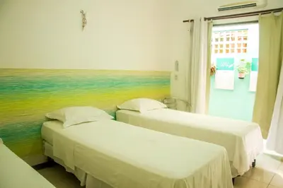 Uma cama ou camas num quarto em A casa é sua!