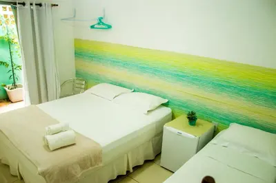 Uma cama ou camas num quarto em A casa é sua!