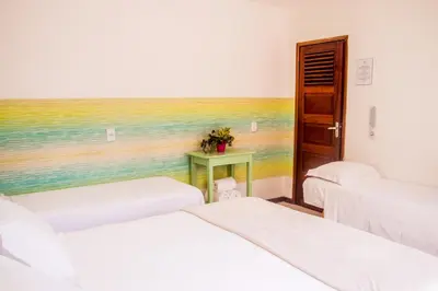 Uma cama ou camas num quarto em A casa é sua!
