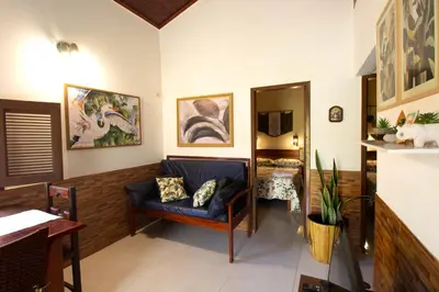Uma área de estar em Casinha Canoa - Casa Com Ar-Condicionados e Localização Perfeita