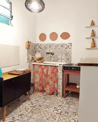 A cozinha ou kitchenette de Casa IURUKUA-bangalos com ou sem cozinha, perto da praia e cercados pela natureza