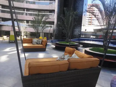 Uma área de estar em Fortaleza VIP Experience