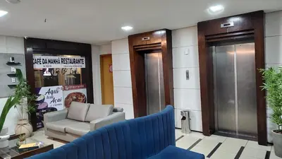 Uma área de estar em Flat Abolição 100m Beira Mar105