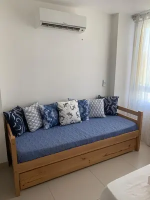 Uma área de estar em Riviera Aquiraz Golf Beach Place Ceará - Apartamento pé na areia
