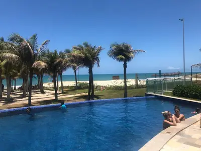 A piscina em ou perto de Riviera Aquiraz Golf Beach Place Ceará - Apartamento pé na areia