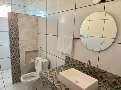 Uma casa de banho em Chalés Panulirus