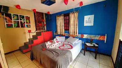 Uma cama ou camas num quarto em Hotel O Alemão