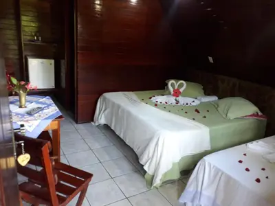 Uma cama ou camas num quarto em Hotel O Alemão