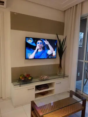 Uma televisão e/ou sistema de entretenimento em Palm Beach Residence