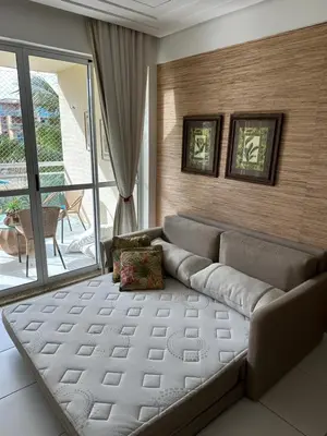Uma cama ou camas num quarto em Palm Beach Residence