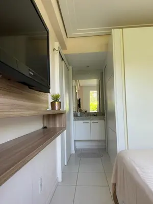 Uma televisão e/ou sistema de entretenimento em Palm Beach Residence
