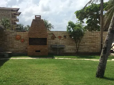 Um jardim no exterior de Eco Paradise Cumbuco frente mar 201