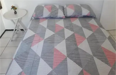 Uma cama ou camas num quarto em Excelente localização, uma quadra antes do BEACH PARK