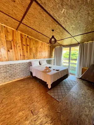 Uma cama ou camas num quarto em Villa Flecheiras