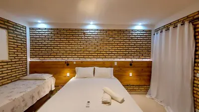 Uma cama ou camas num quarto em Villa Flecheiras