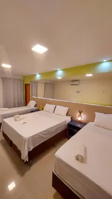 Uma cama ou camas num quarto em Villa Flecheiras