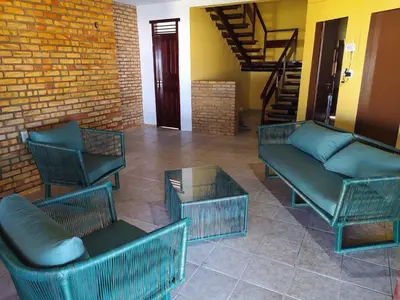 Uma área de estar em Casa de Praia no Morro Branco