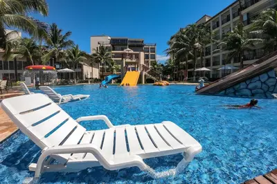 A piscina em ou perto de Beach Living Pé na Areia por Be My Guest