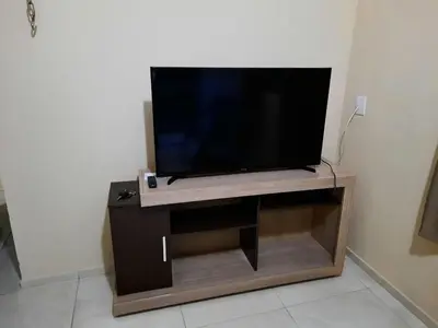 Uma televisão e/ou sistema de entretenimento em Casa Neto&Lu