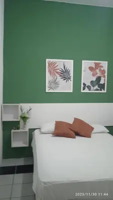 Uma cama ou camas num quarto em House755 Hospedaria