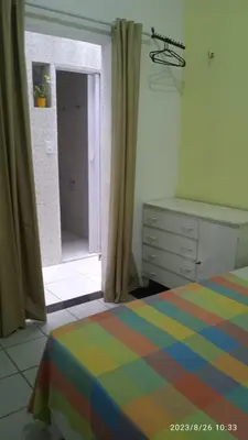 Uma cama ou camas num quarto em House755 Hospedaria