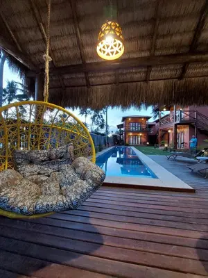 A piscina em ou perto de Pousada Flor de Lena- suíte Lírio -Icaraizinho