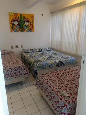 Uma cama ou camas num quarto em Ap por temporada com 2 quartos e uma suíte , excelente área de lazer, Praia do Futuro, condomínio Cartier-Fortaleza