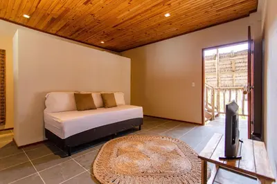 Uma cama ou camas num quarto em Casa dos Irmãos
