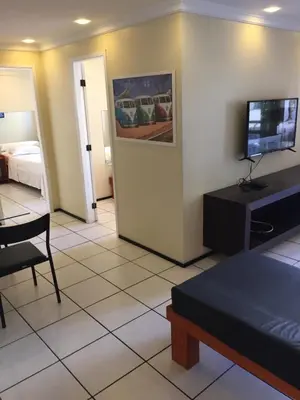 Uma cama ou camas num quarto em Porto de Iracema apartamentos