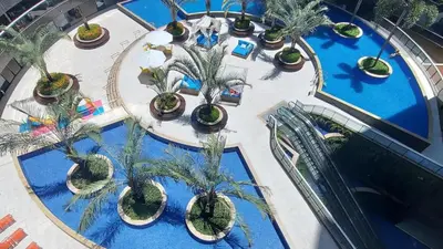 A piscina em ou perto de LANDSCAPE - Apartamento Mobiliado na Beira Mar
