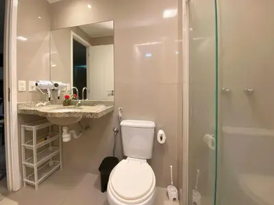 Uma casa de banho em VG FUN varanda para o mar