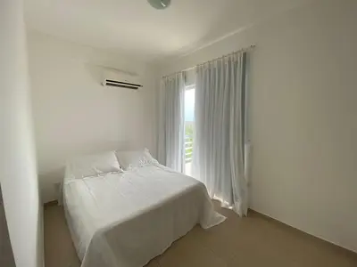 Uma cama ou camas num quarto em Casa em Condomínio, Aquiraz - CE