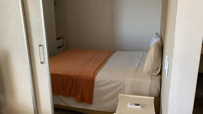 Uma cama ou camas num quarto em Iracema Flat 501 Fortaleza