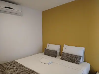 Uma cama ou camas num quarto em Iracema Flat 501 Fortaleza