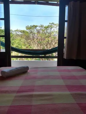 Uma cama ou camas num quarto em Paracuru Kite Village