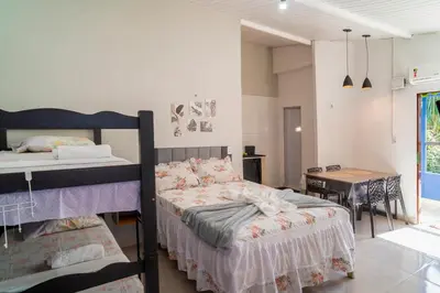 Uma cama ou camas num quarto em Vila Davi Jeri - Flats e Casa