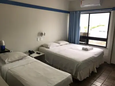 Uma cama ou camas num quarto em 703 Flat mobiliado Praia de Iracema
