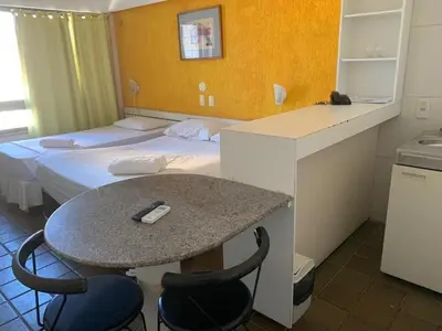 Uma cama ou camas num quarto em 403 Flat mobiliado Praia de Iracema