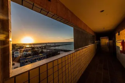O nascer ou o pôr do sol visto a partir do apartamento