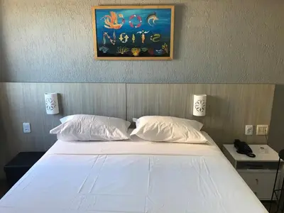Uma cama ou camas num quarto em 503 Flat mobiliado Praia de Iracema